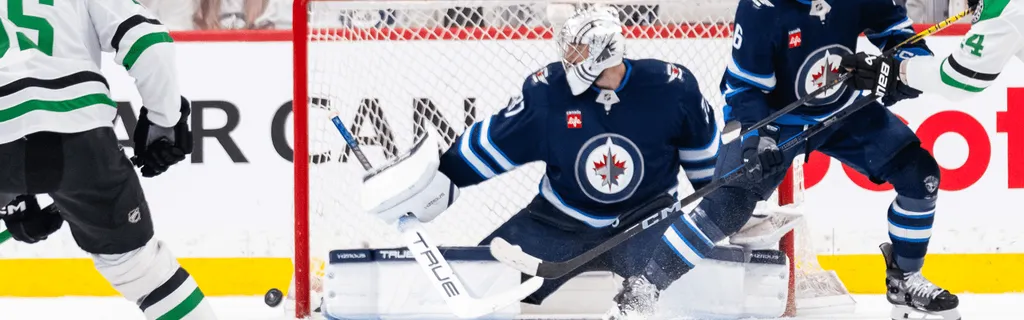 Hellebuyck makes 21 saves, Jets shut out Stars in Game 2 to even West 2nd Round